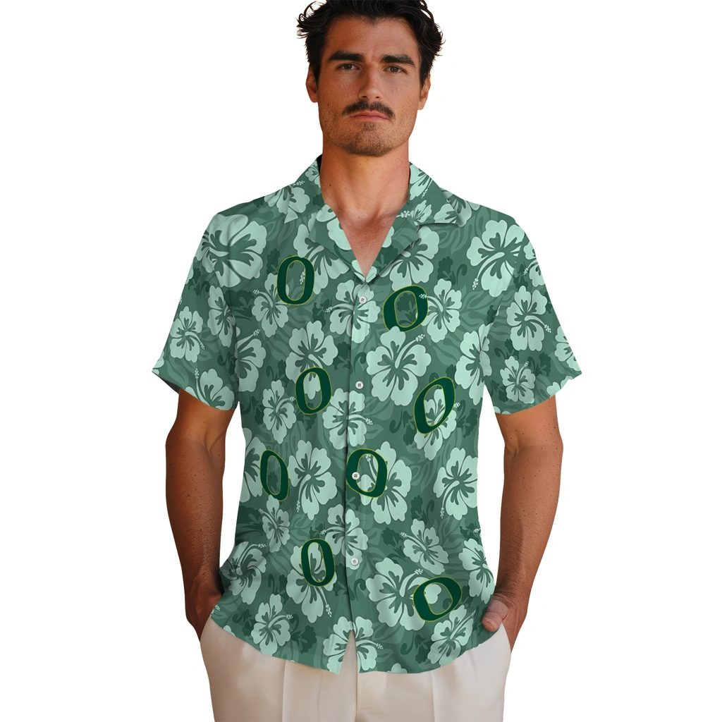 oregon-ducks-hawaiian-shirt-hibiscus-cluster-green-fashion-forward.webp