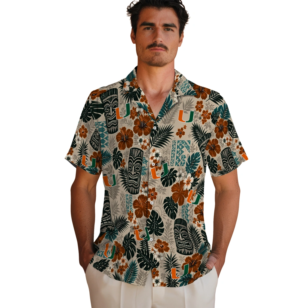 miami-hurricanes-hawaiian-shirt-custom-tiki-masks-warm-beige-fashion-forward.webp