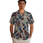 new-england-patriots-hawaiian-shirt-personalized-tiki-masks-warm-beige-best-selling.webp