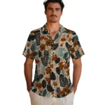 oklahoma-state-cowboys-hawaiian-shirt-custom-tiki-masks-warm-beige-best-selling.webp