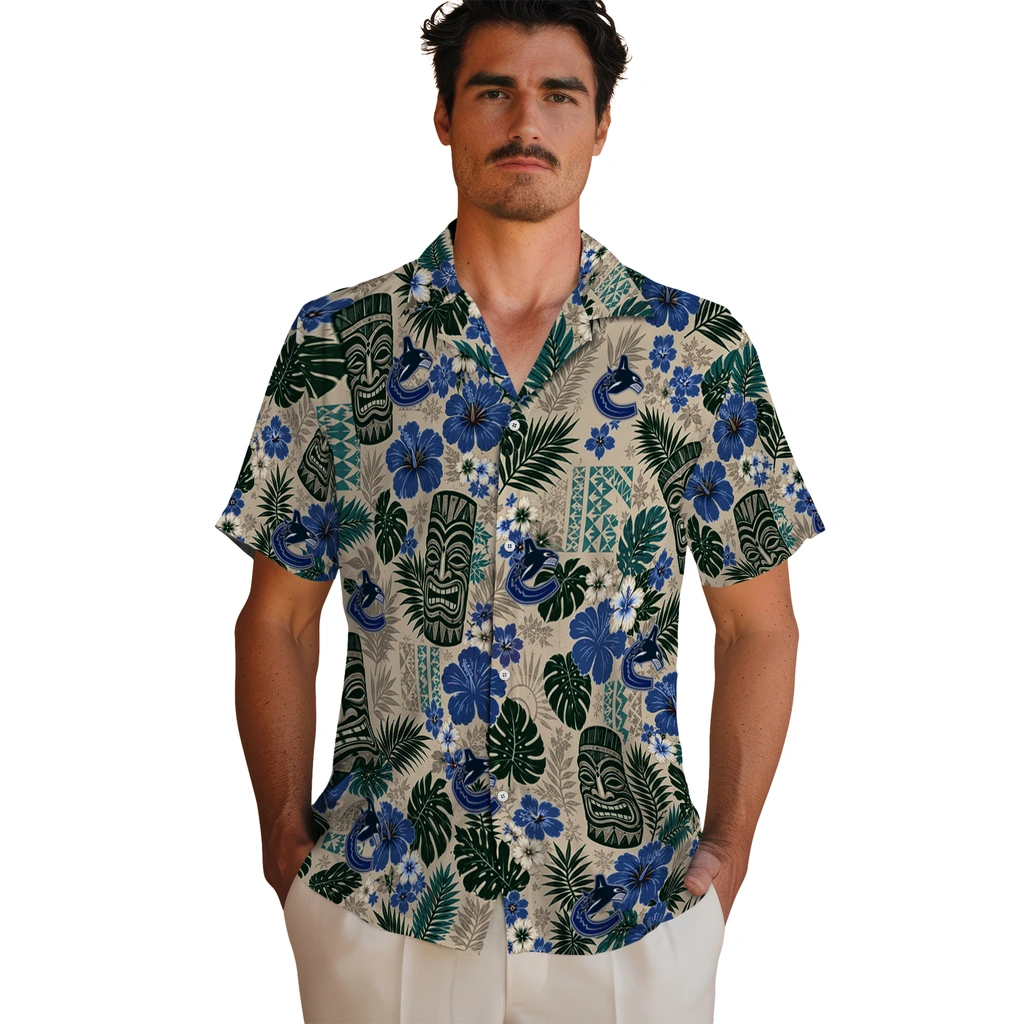 vancouver-canucks-hawaiian-shirt-personalized-tiki-masks-warm-beige-fashion-forward.webp
